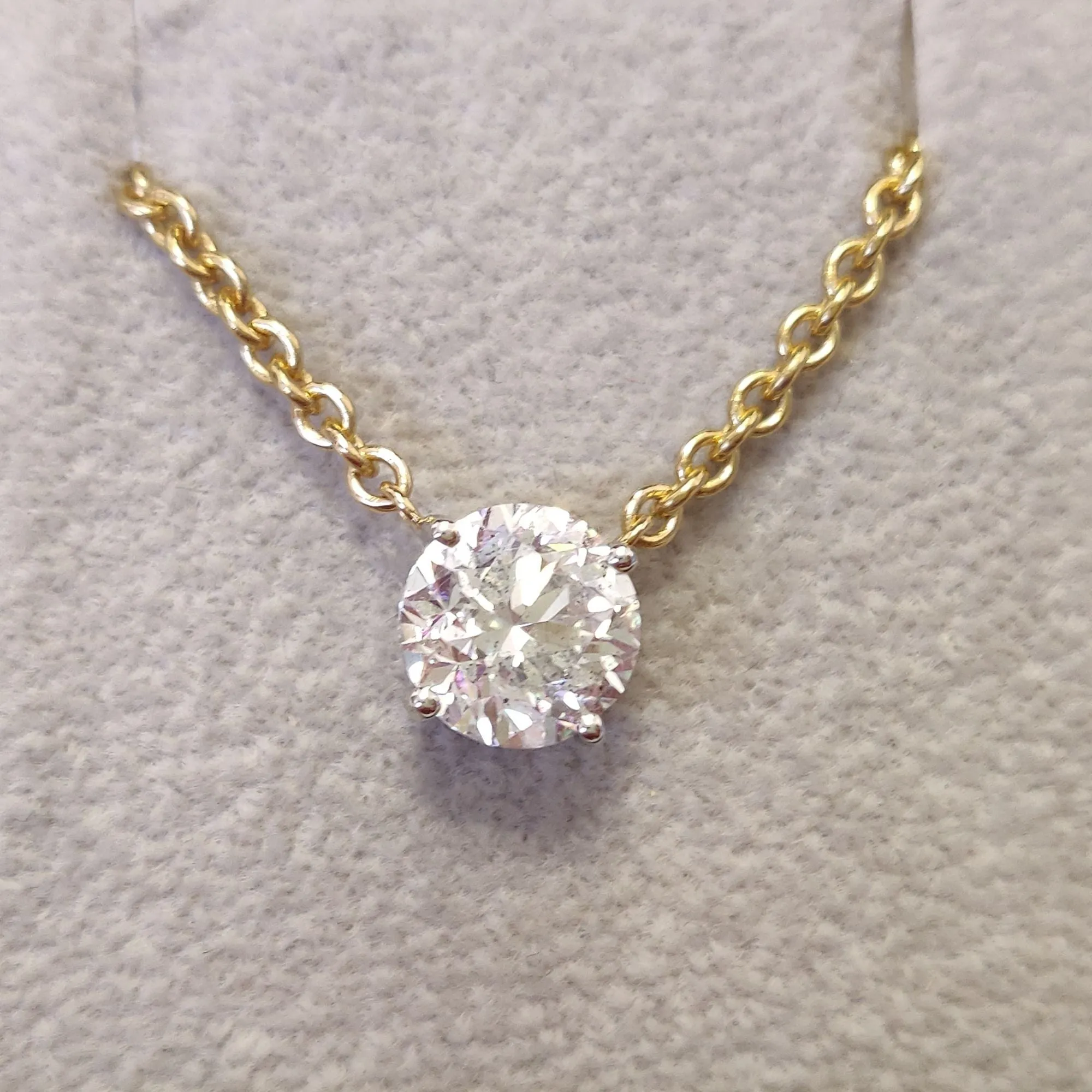 Heiligenschein Natural Diamond Solitaire Pendant with a Yellow Necklace