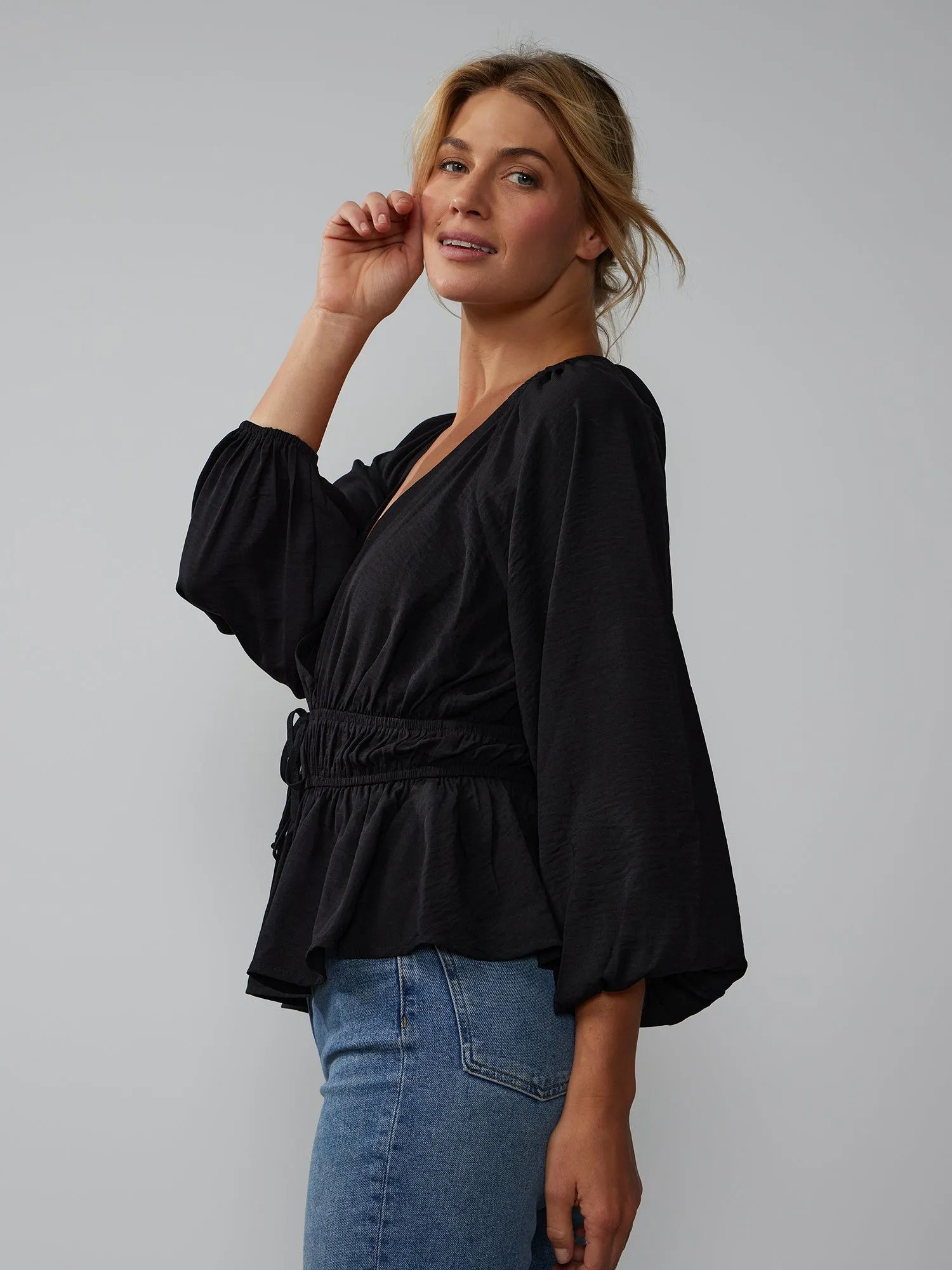 Long Sleeve V-Neck Peplum Waist Top