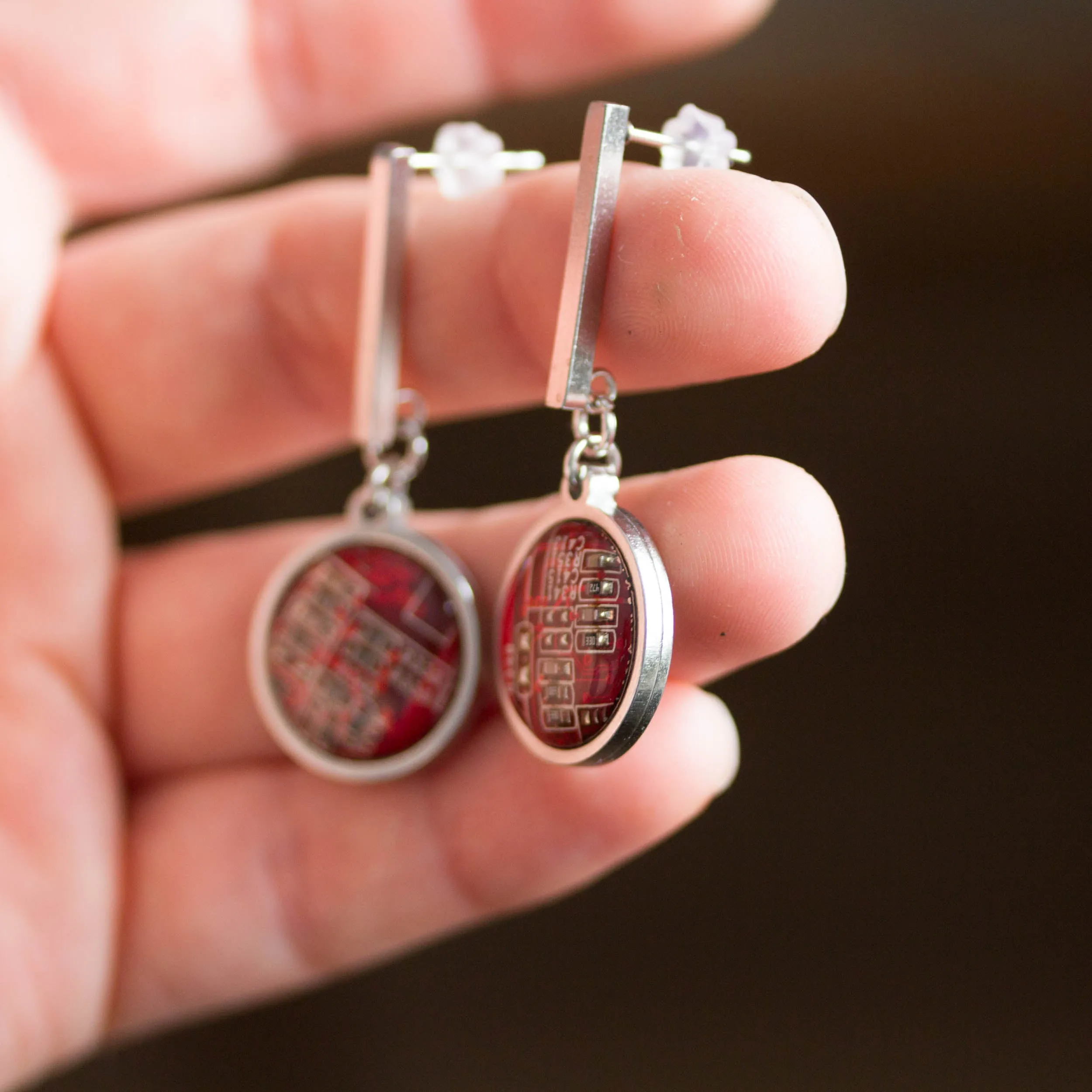 Stud earrings with 15mm round circuit board pendants, steel wires